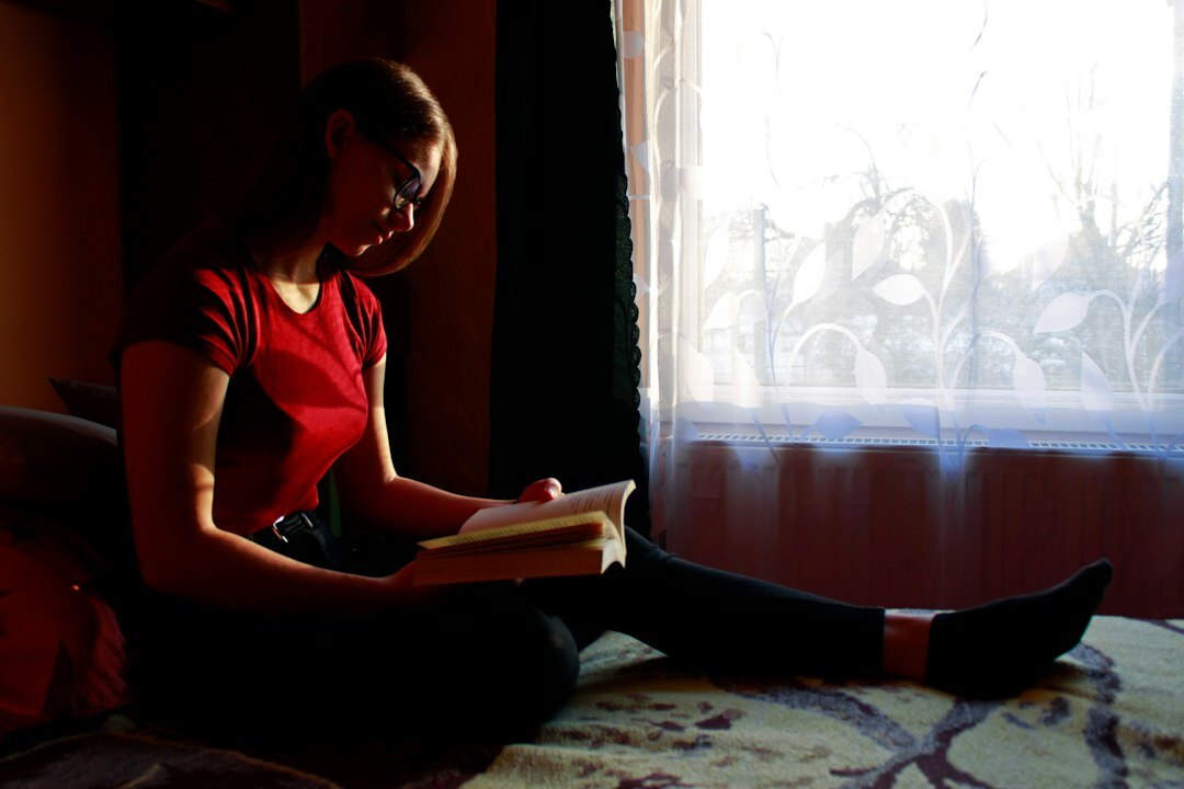 Turkish woman reading a legal document at home
